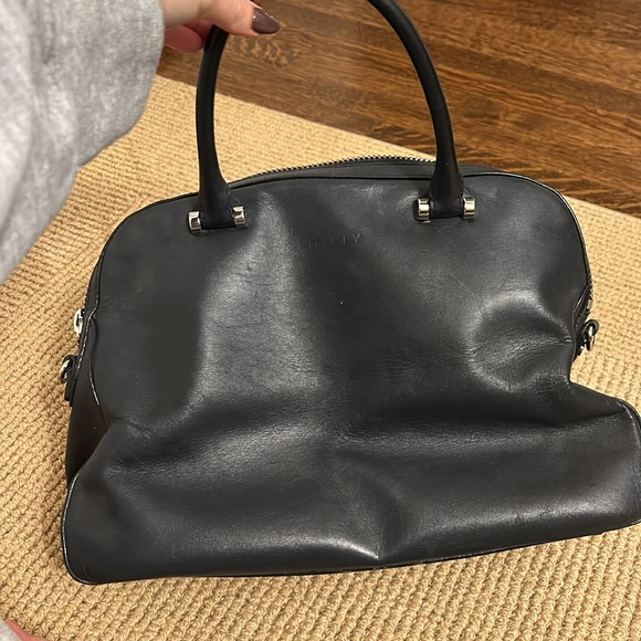 Good condition. Pockets on the inside and outside. Fits lot of stuff inside. - Picture 3 of 5